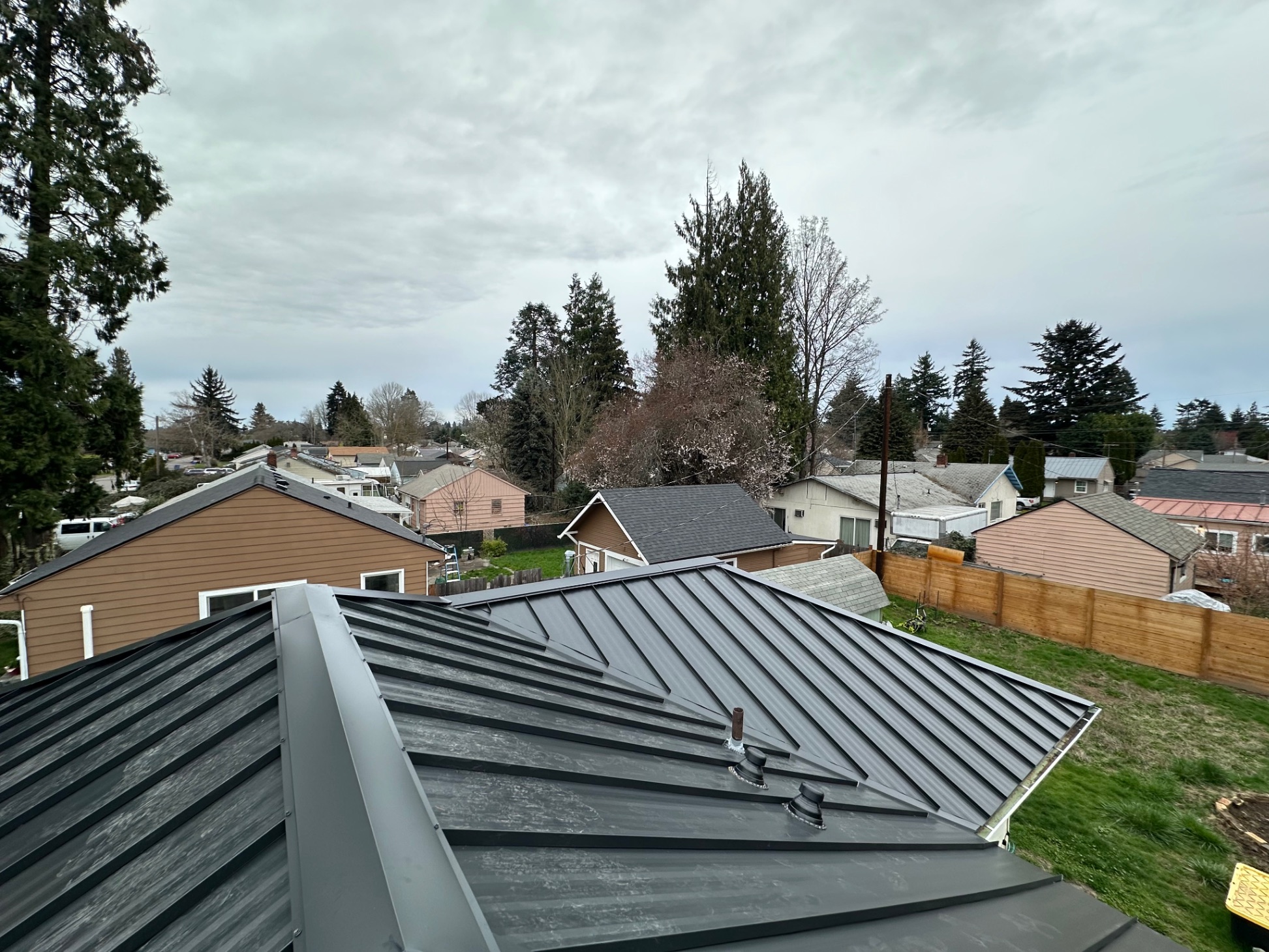 Standing seam metal roof installation — Firu Construction